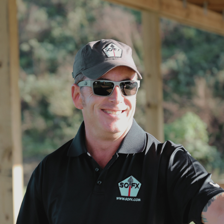 Sam Havelock, founder of Wired to Win, wearing a SOFX cap